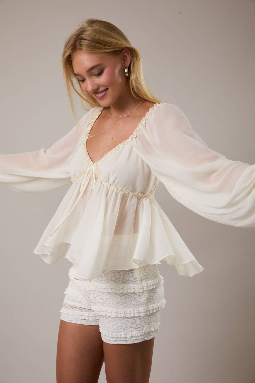 RUFFLE DETAIL LONG SLEEVE FLARE BLOUSE